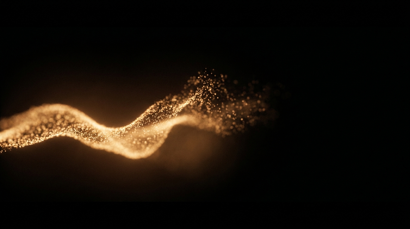 Ein Strom goldener Partikel zerfällt und verliert sich im Dunkeln.